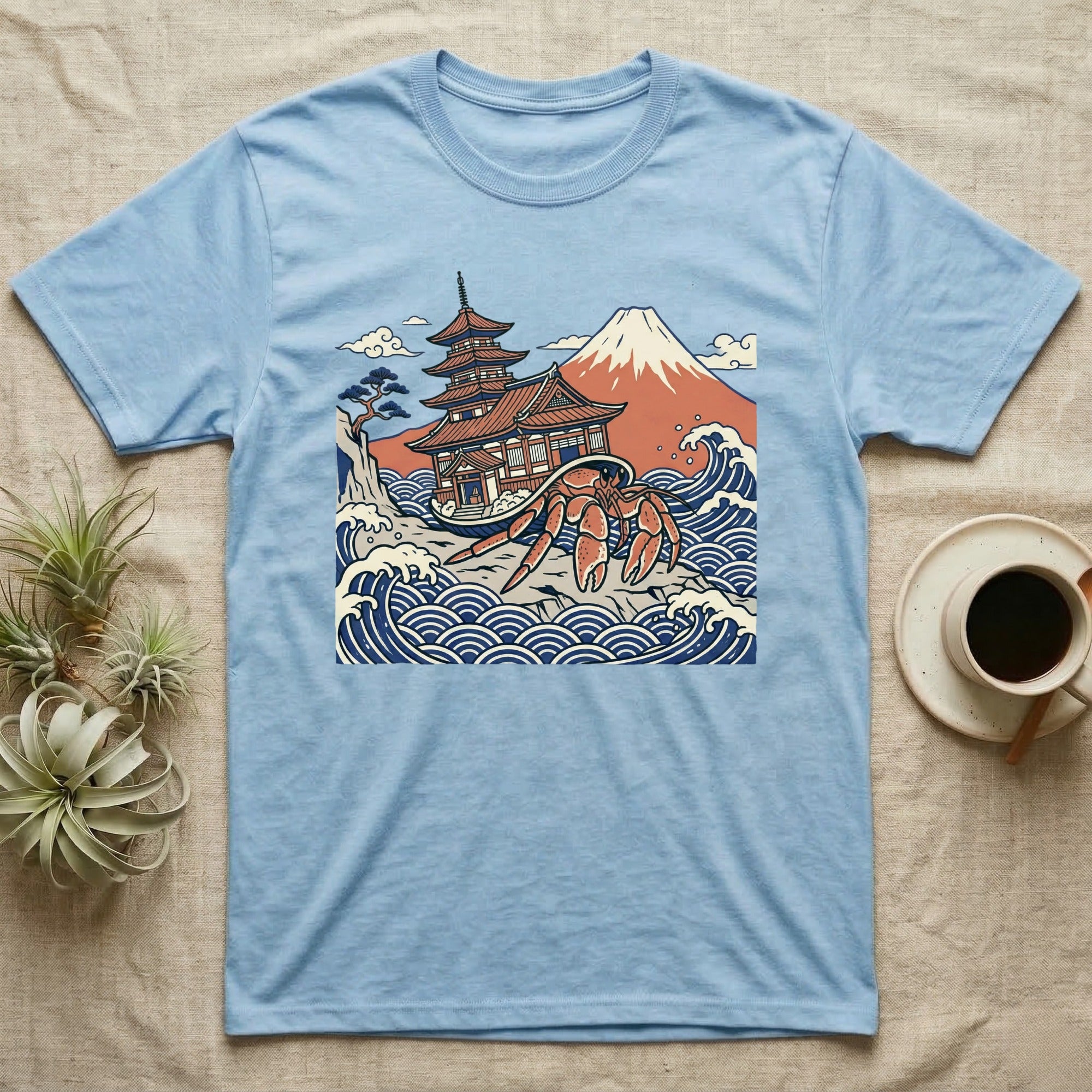 Light blue t-shirt with Japanese temple, Mt. Fuji, and a large crab on waves.