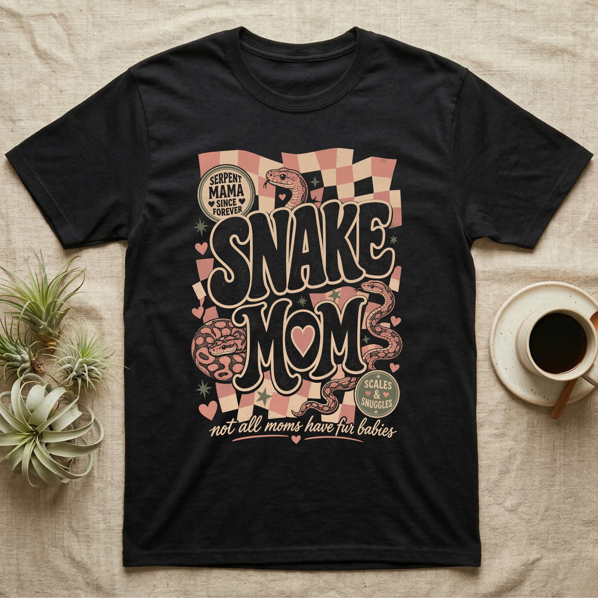 Black t-shirt with "Serpent Mama" and "Snake Mom" text and snake graphics.