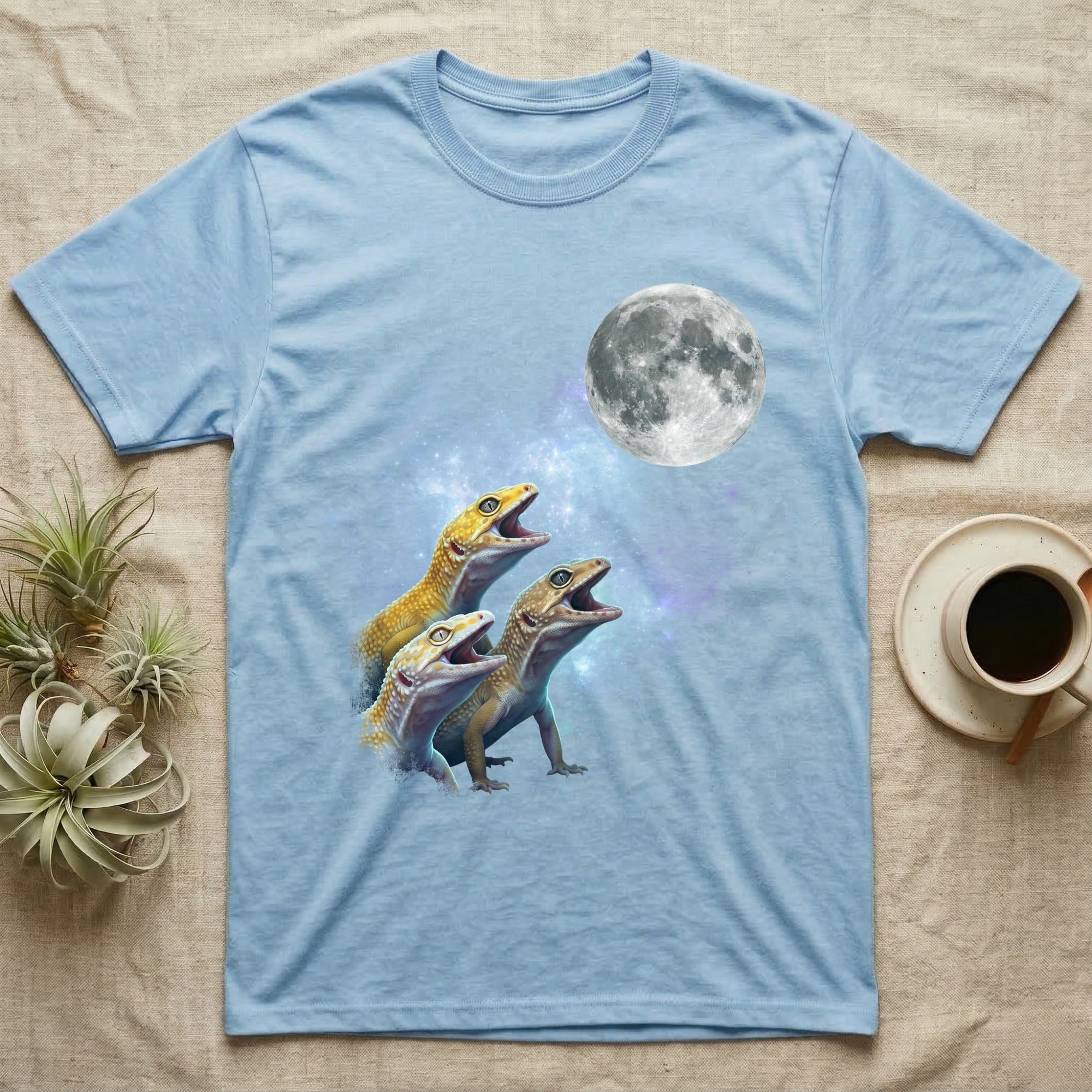 Leopard Gecko Moon Howl T-Shirt in Light Blue — Three Leopard Gecko colour morphs howling at a full moon over a nebula on a dark grey t-shirt.