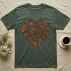 Green t-shirt with a heart-shaped design of a lizard and natural elements.
