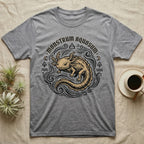 Grey t-shirt with a golden axolotl graphic and "Monstrum Aquosum" text.