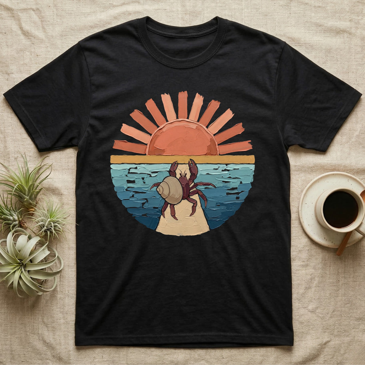 Hermit Crab Big Stretch T-Shirt in Black — Palette-knife painted medallion of a Caribbean hermit crab at full stretch under a coral sunburst.