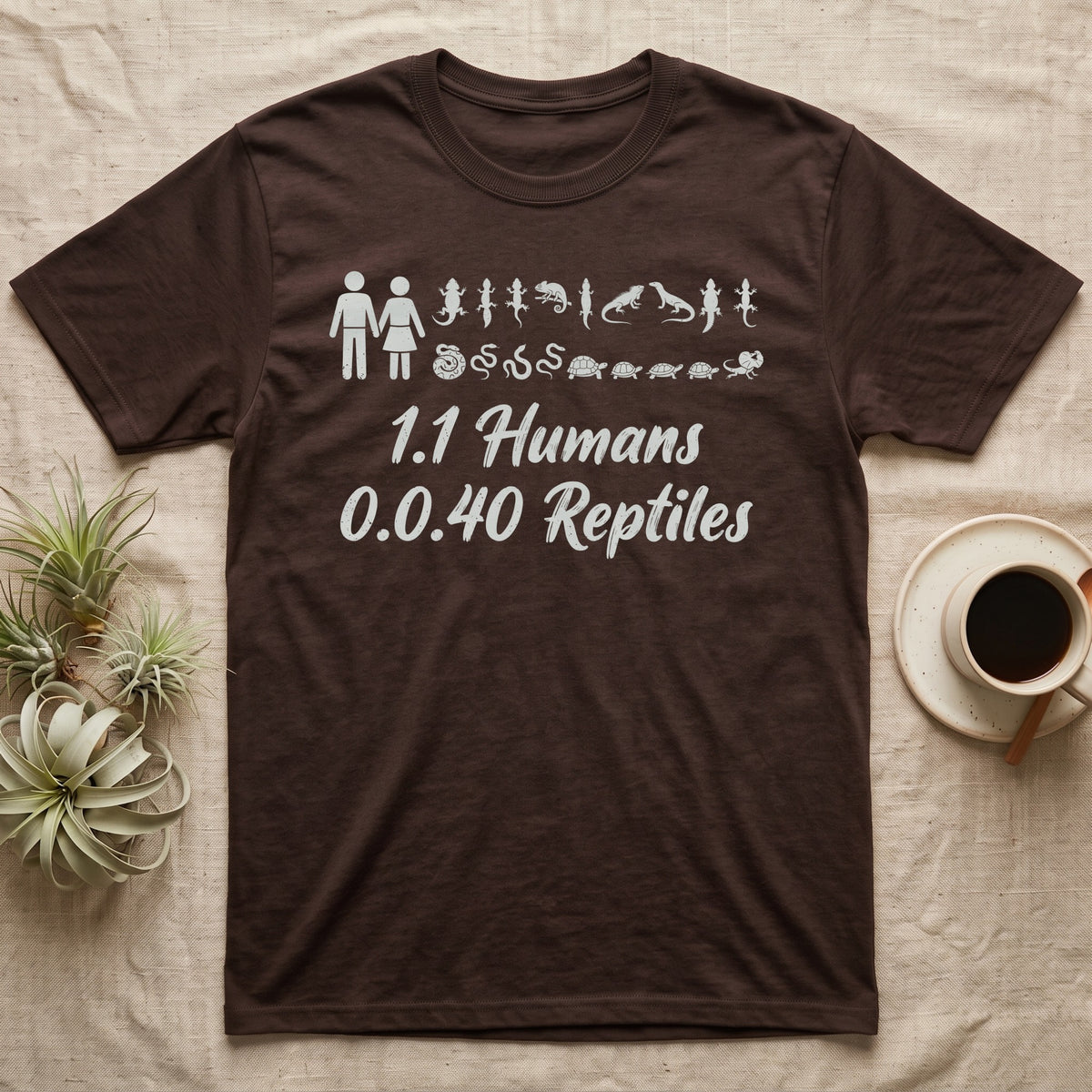 Reptile Family Decal T-Shirt in Dark Chocolate — Stick-figure family decal of two humans beside two rows of reptile stickers, over script reading 1.1 Humans 0.0.40 Reptiles