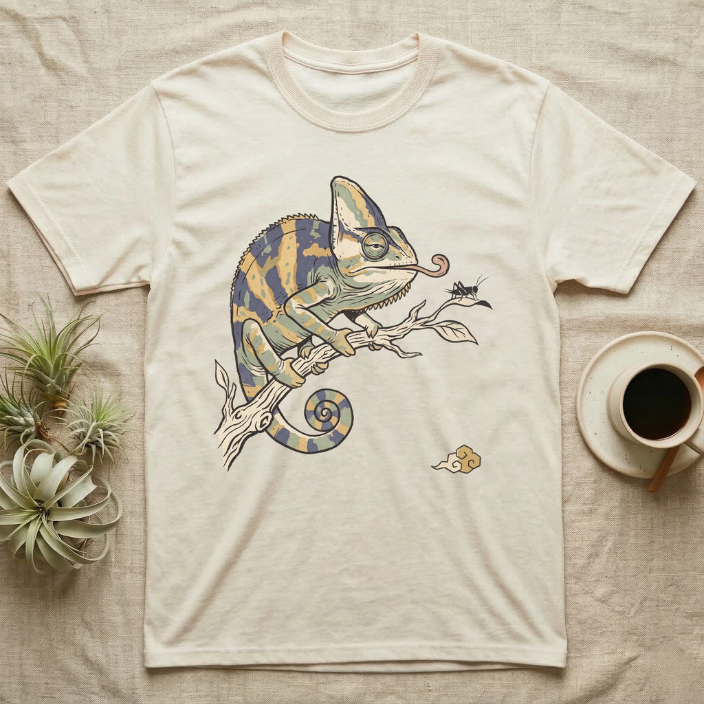 Veiled Chameleon Diet T-Shirt in Natural — Ukiyo-e woodblock illustration of a veiled chameleon extending its tongue, with a deadpan serif caption beneath the subject.