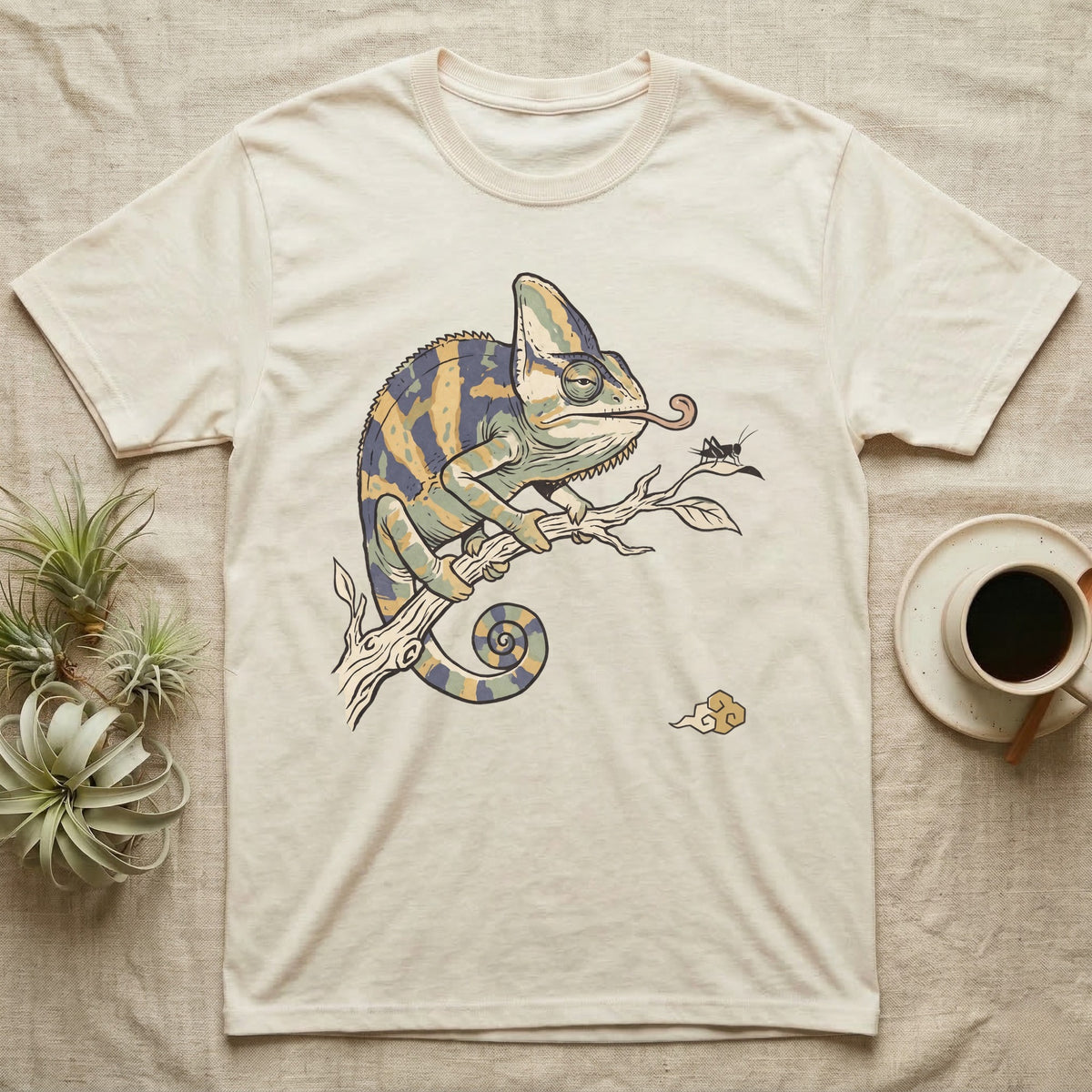 Veiled Chameleon Diet T-Shirt in Natural — Ukiyo-e woodblock illustration of a veiled chameleon extending its tongue, with a deadpan serif caption beneath the subject.