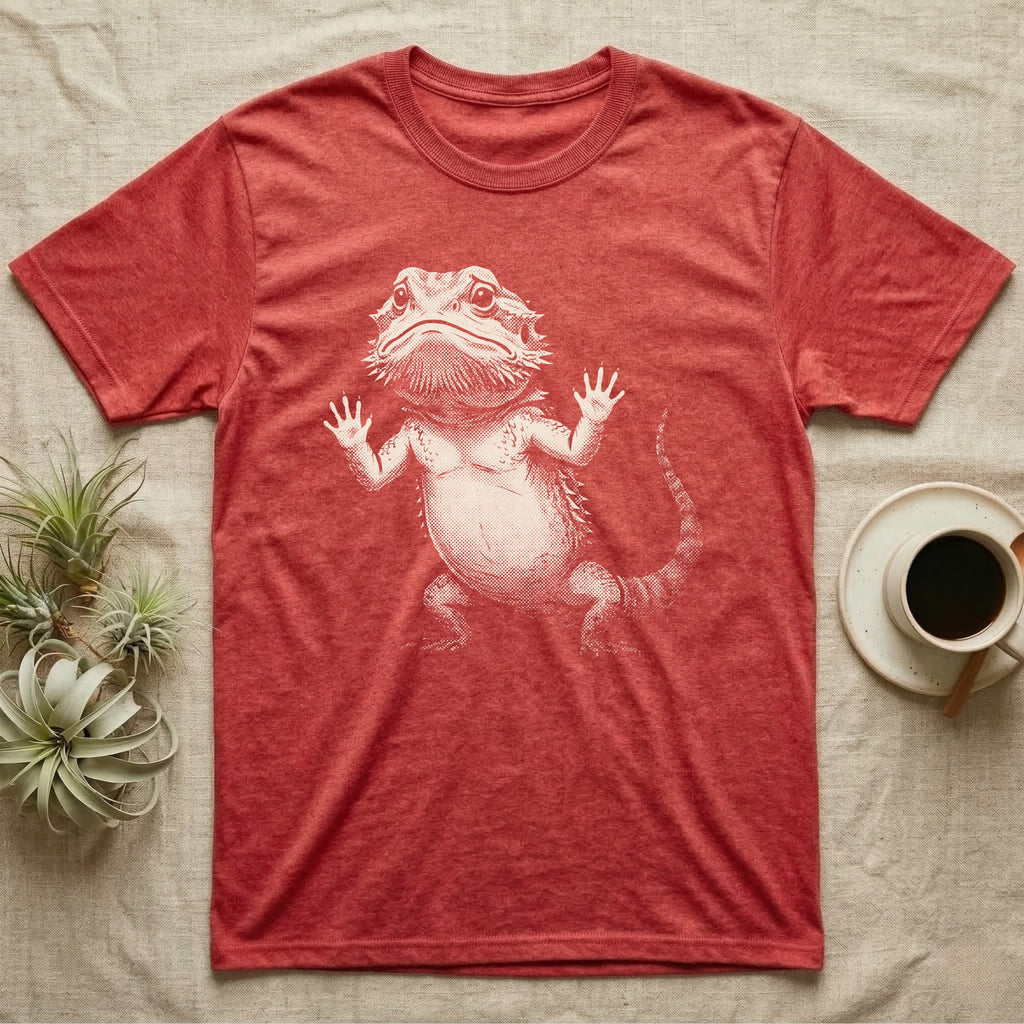 Begging Bearded Dragon T-Shirt in Heather Red — Sad-meme halftone illustration of a bearded dragon standing upright with arms pressed to unseen glass, looking forlorn.