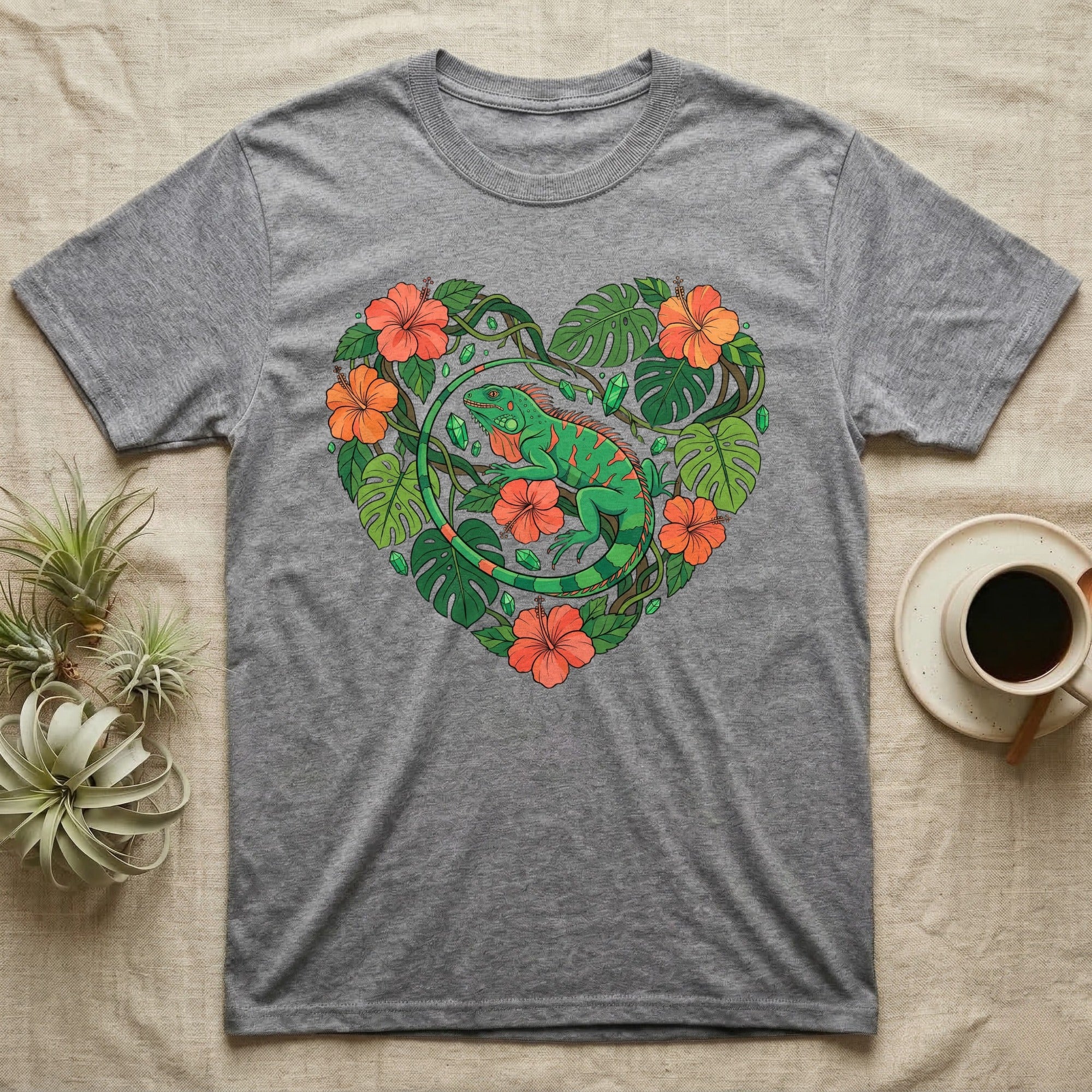 Grey t-shirt with a green iguana and tropical flowers forming a heart.