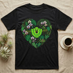 Black t-shirt with a green snake and tropical leaves forming a heart.