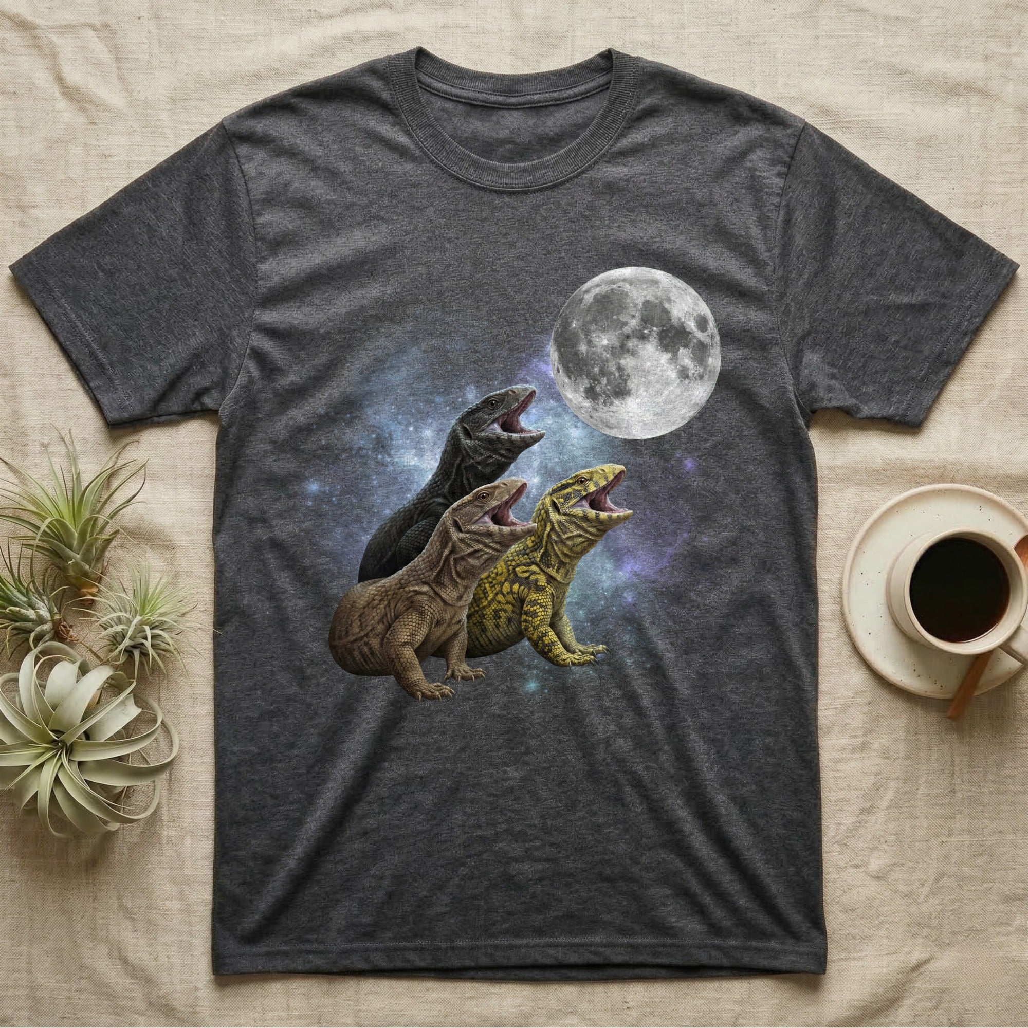Savannah Monitor Moon Howl T-Shirt in Dark Heather — Three Savannah Monitor colour morphs howling at a full moon over a nebula on a dark grey t-shirt.