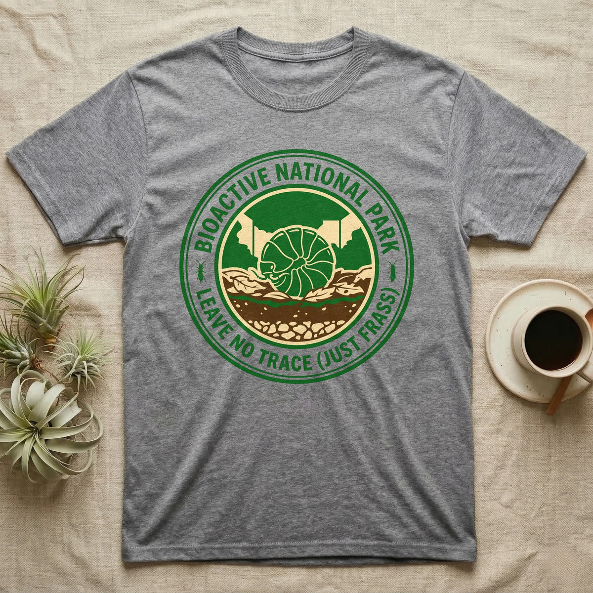 Pillbug Bioactive National Park T-Shirt in Sport Grey — Green ranger badge with a rolled pillbug in a cross-sectioned bioactive enclosure and springtail stars.