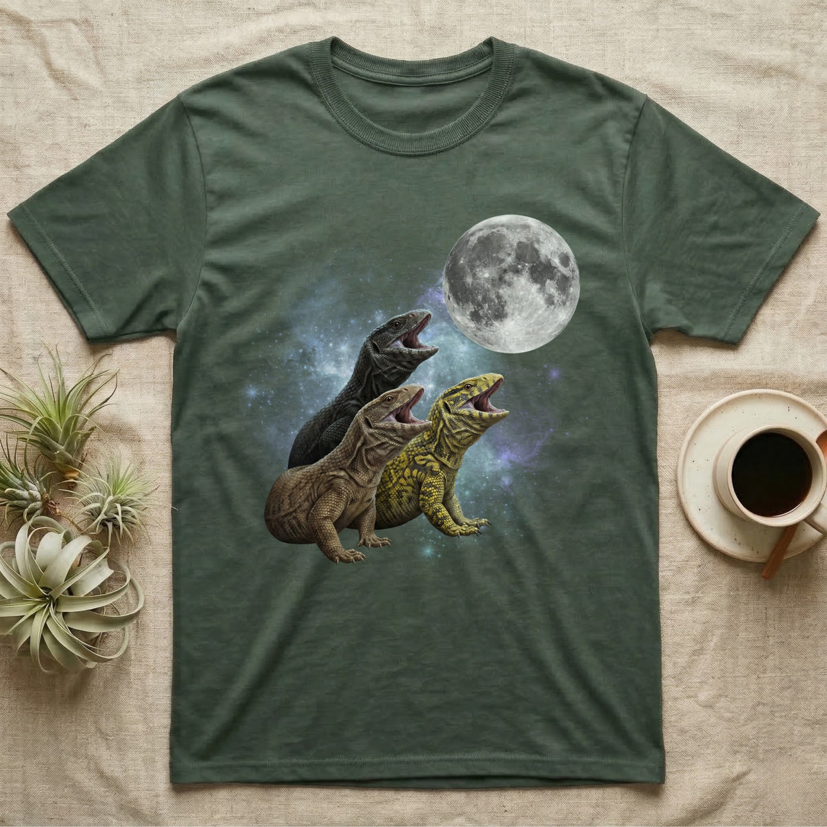 Savannah Monitor Moon Howl T-Shirt in Military Green — Three Savannah Monitor colour morphs howling at a full moon over a nebula on a dark grey t-shirt.