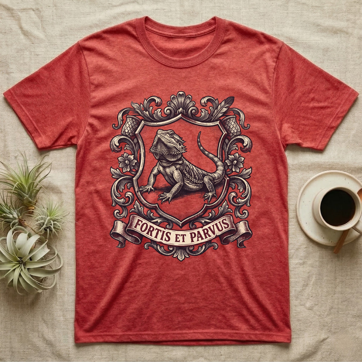 Bearded Dragon Heraldry T-Shirt in Heather Red — Engraved heraldic crest of a bearded dragon posed as a regal dragon on a shield with a ribbon banner.