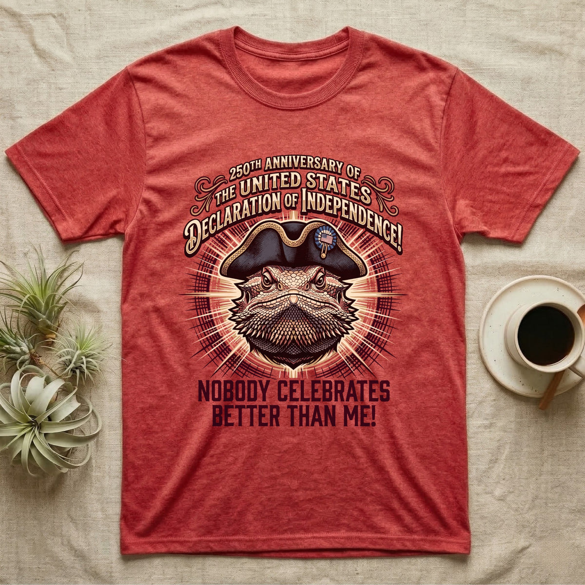 Bearded Dragon Declaration T-Shirt in Heather Red — Ornate engraved bearded dragon portrait in a tricorn hat on a cream sunburst with Nobody Celebrates Better Than Me.