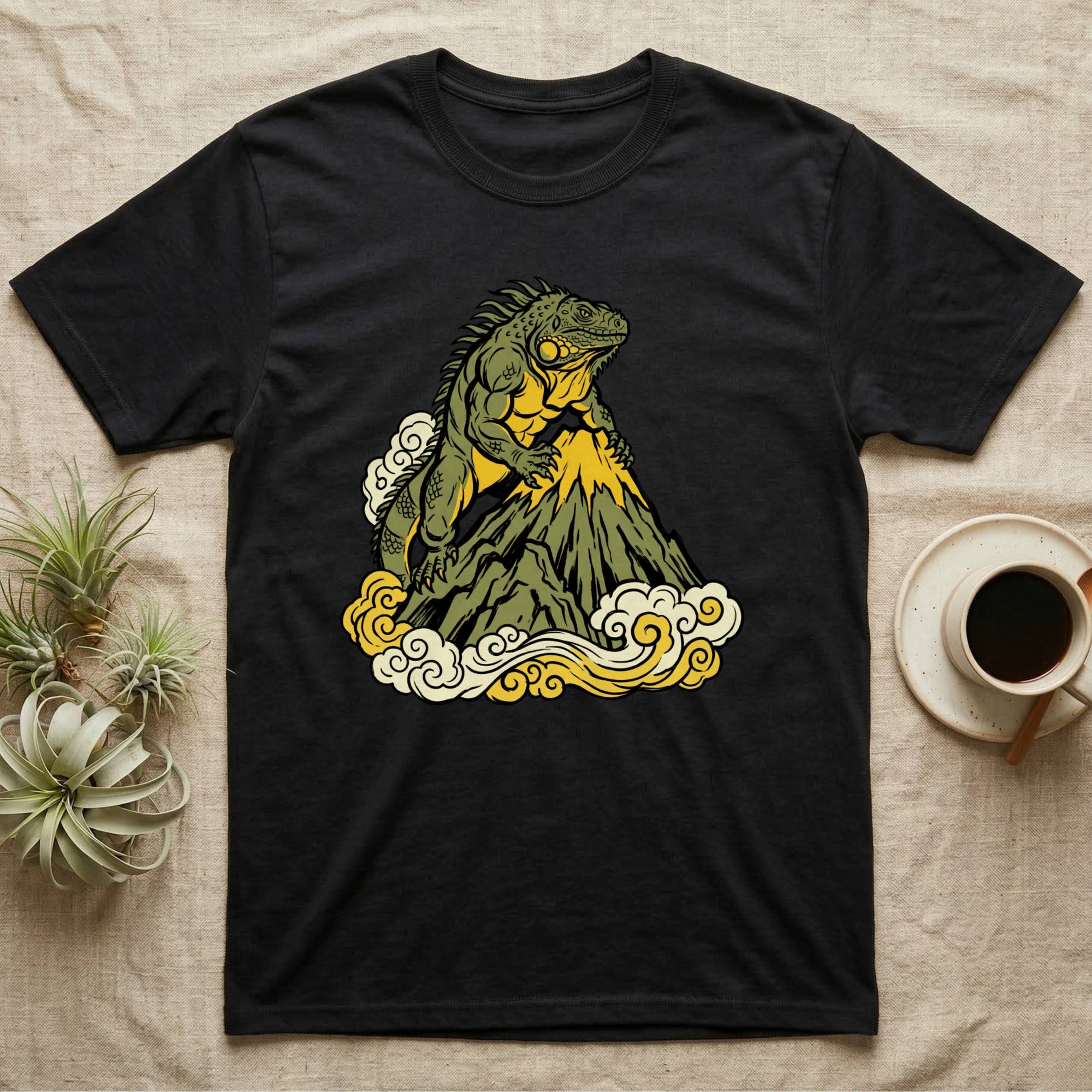 Black t-shirt with a green iguana on a mountain with clouds.
