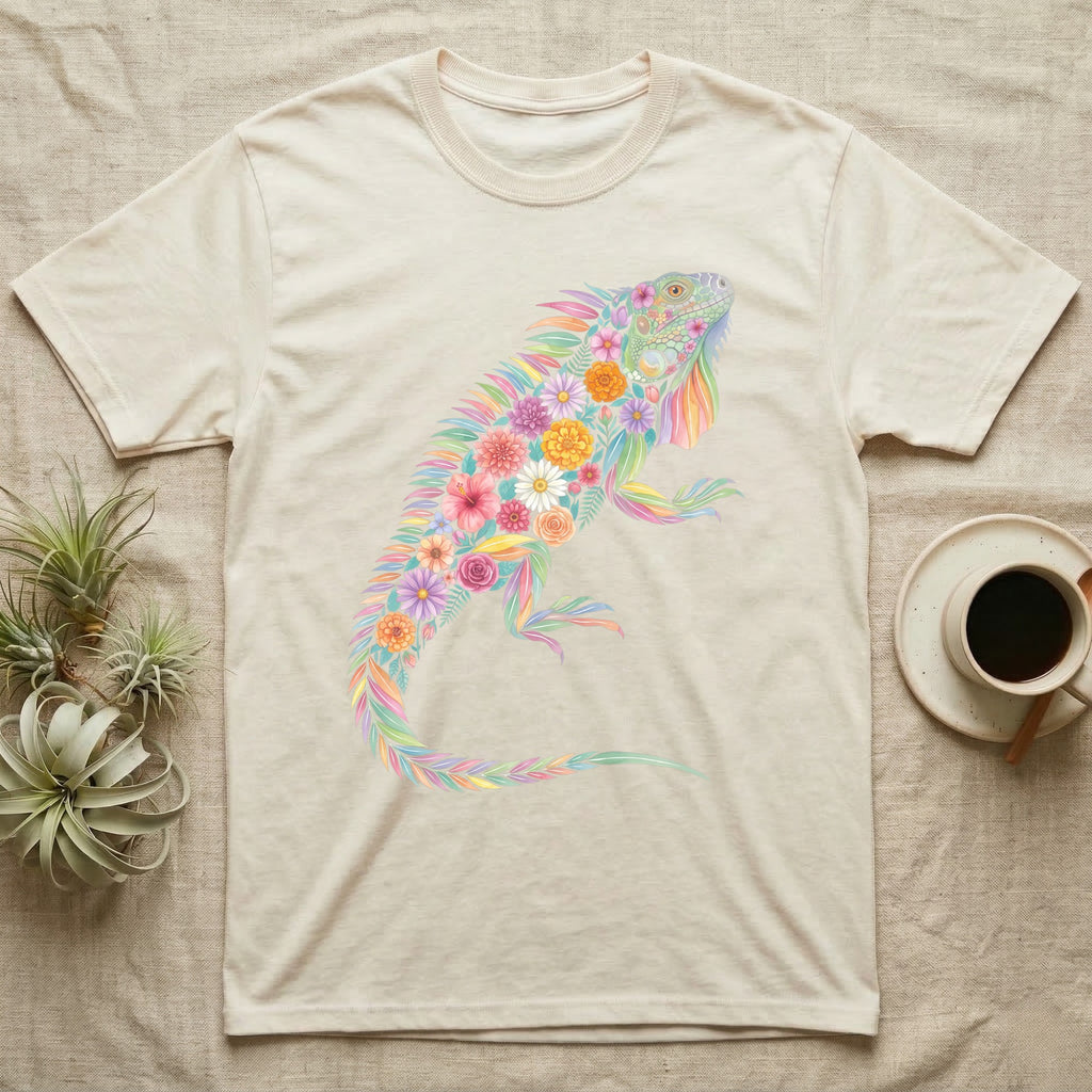 Green Iguana Floral Mosaic T-Shirt in Natural — Watercolour green iguana climbing, its whole body built from painted hibiscus, dandelion and leaf shapes.