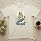 T-shirt with a chinchilla illustration sitting on stacked stones, holding a scroll.
