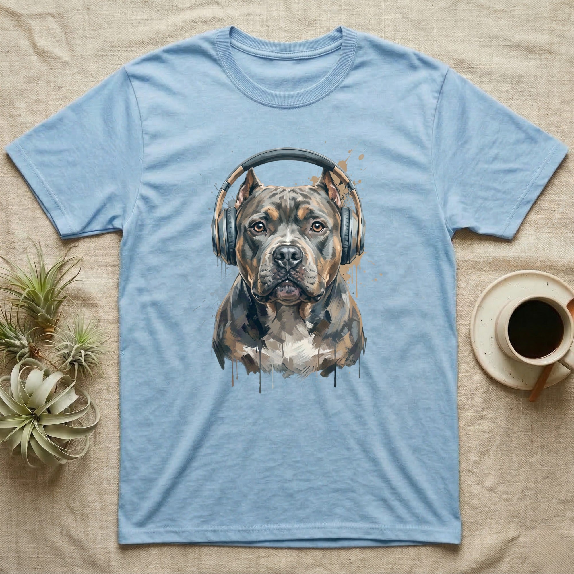 Light blue t-shirt with a watercolor pitbull wearing headphones.
