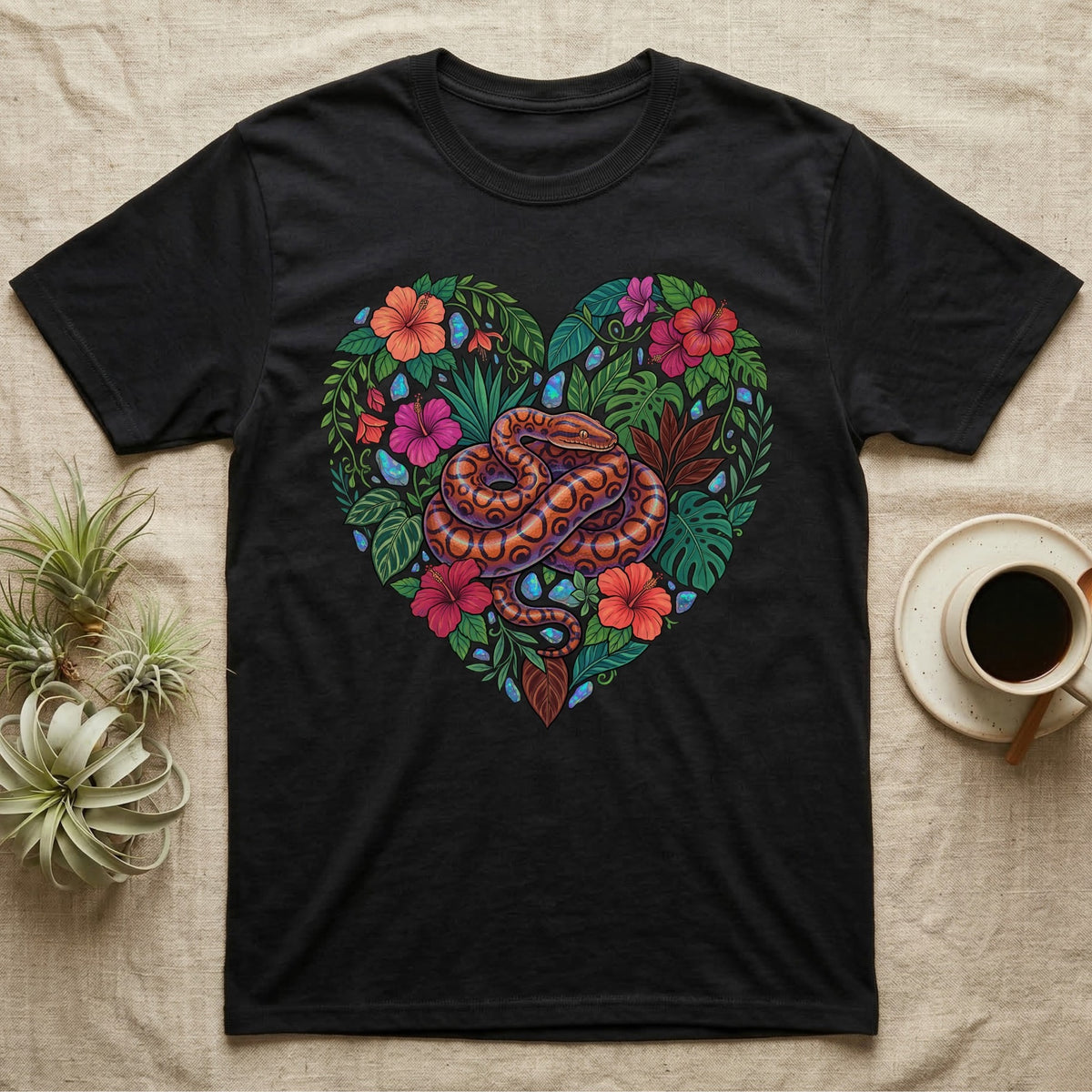 Black t-shirt featuring a heart-shaped floral design with a snake in the center.