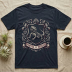 Bearded Dragon Heraldry T-Shirt in Navy — Engraved heraldic crest of a bearded dragon posed as a regal dragon on a shield with a ribbon banner.