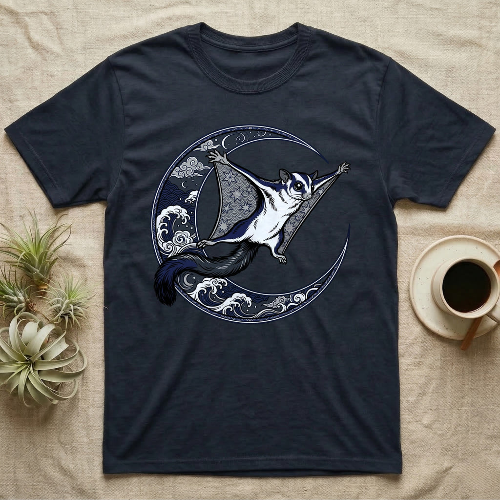 Dark t-shirt with a flying sugar glider on a crescent moon and waves.