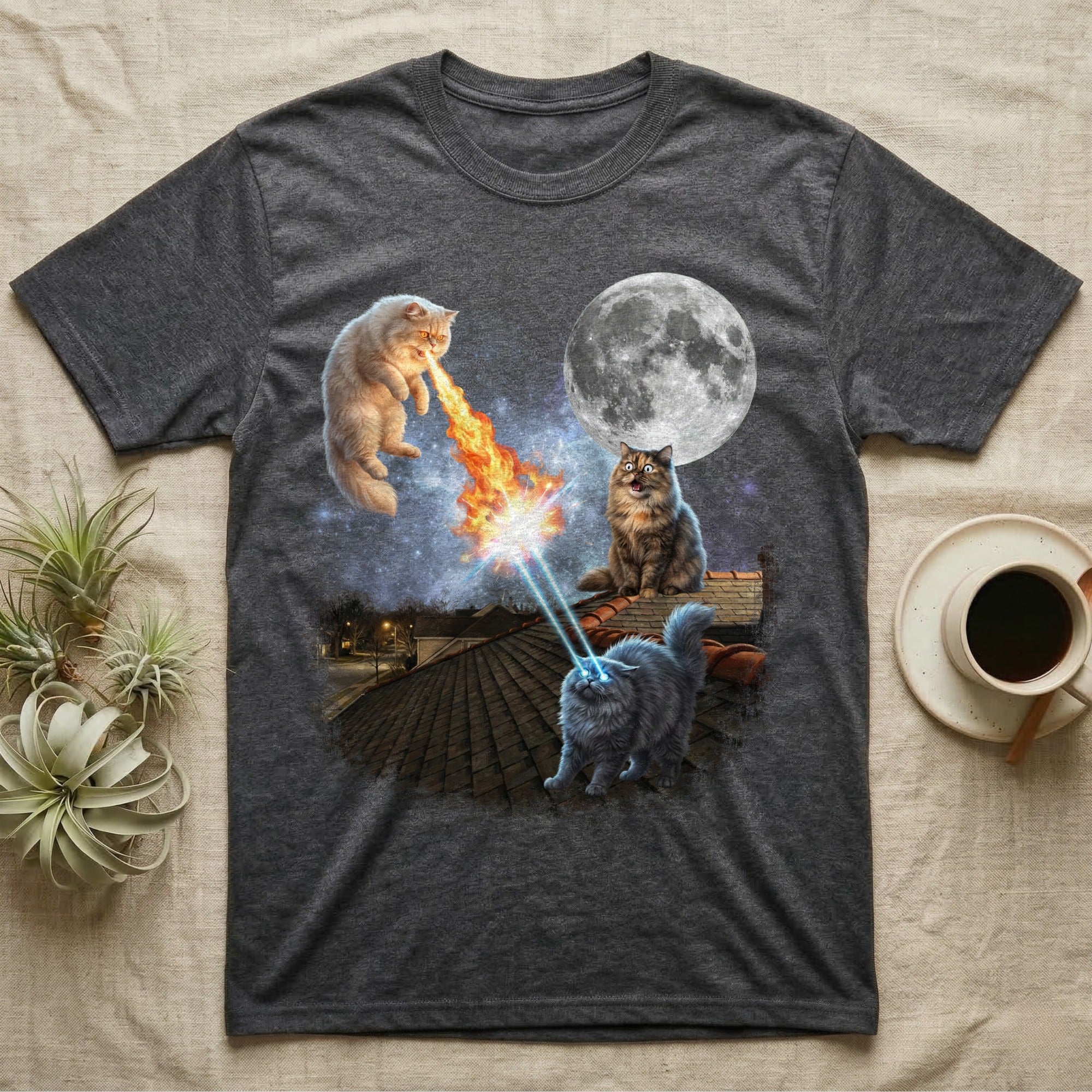 Dark t-shirt with graphic of two cats battling with laser eyes and fire.