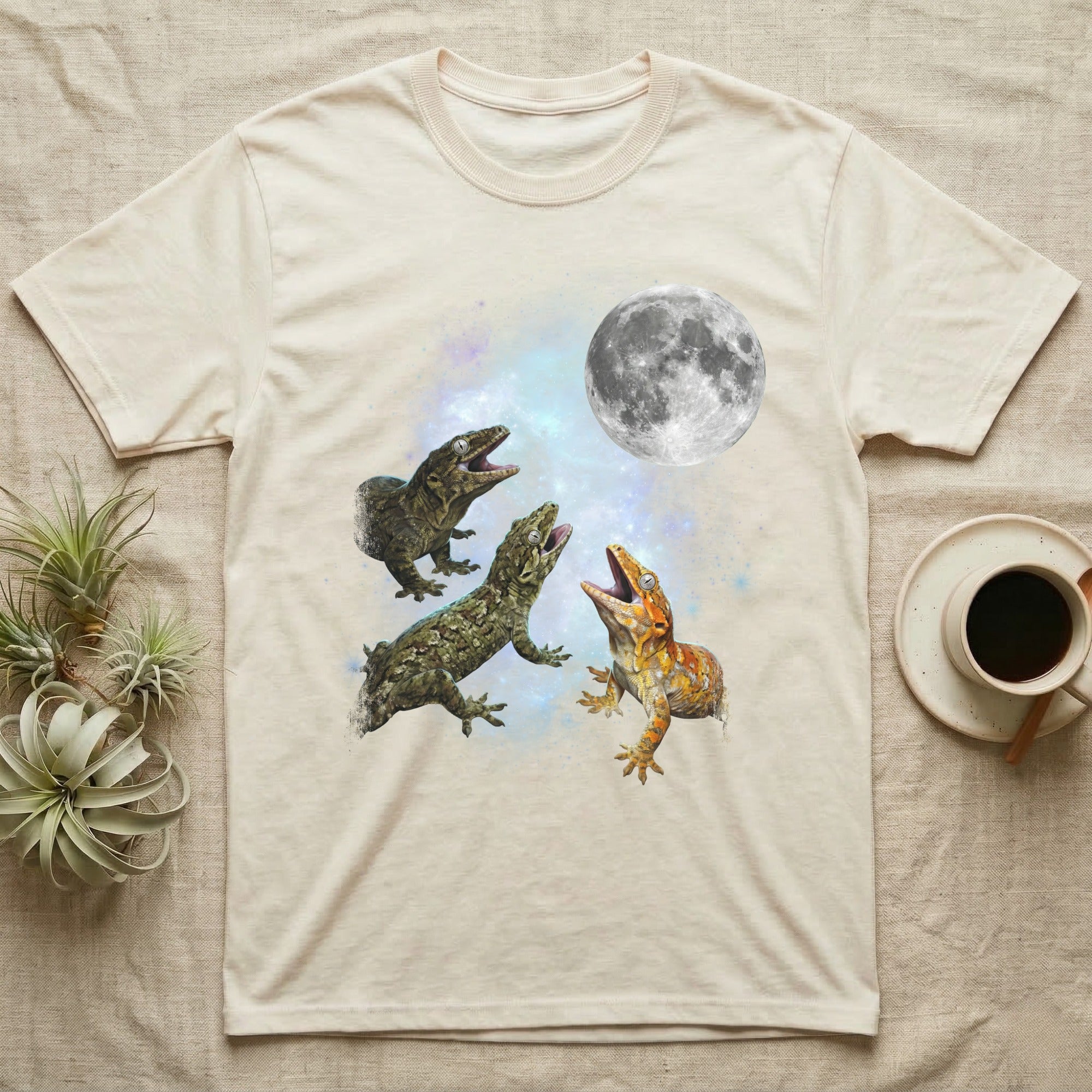 Leachianus Gecko Moon Howl T-Shirt in Natural — Three Leachianus Gecko colour morphs howling at a full moon over a nebula on a dark grey t-shirt.