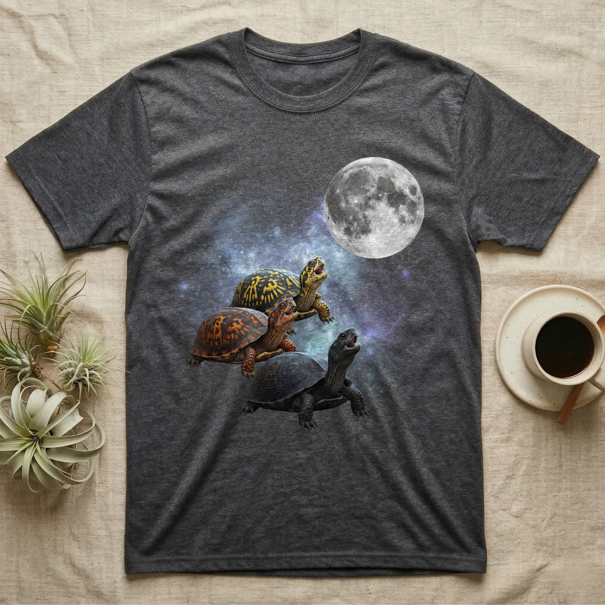 Eastern Box Turtle Moon Howl T-Shirt in Dark Heather — Three Eastern Box Turtle colour morphs howling at a full moon over a nebula on a dark grey t-shirt.