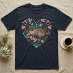Dark t-shirt with a Siamese cat in a floral heart design.