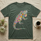 Green Iguana Floral Mosaic T-Shirt in Military Green — Watercolour green iguana climbing, its whole body built from painted hibiscus, dandelion and leaf shapes.