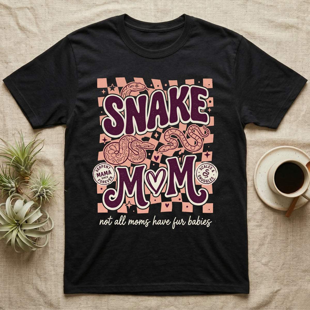 Black t-shirt with "Snake Mom" text and snake graphics, reading "not all moms have fur babies".