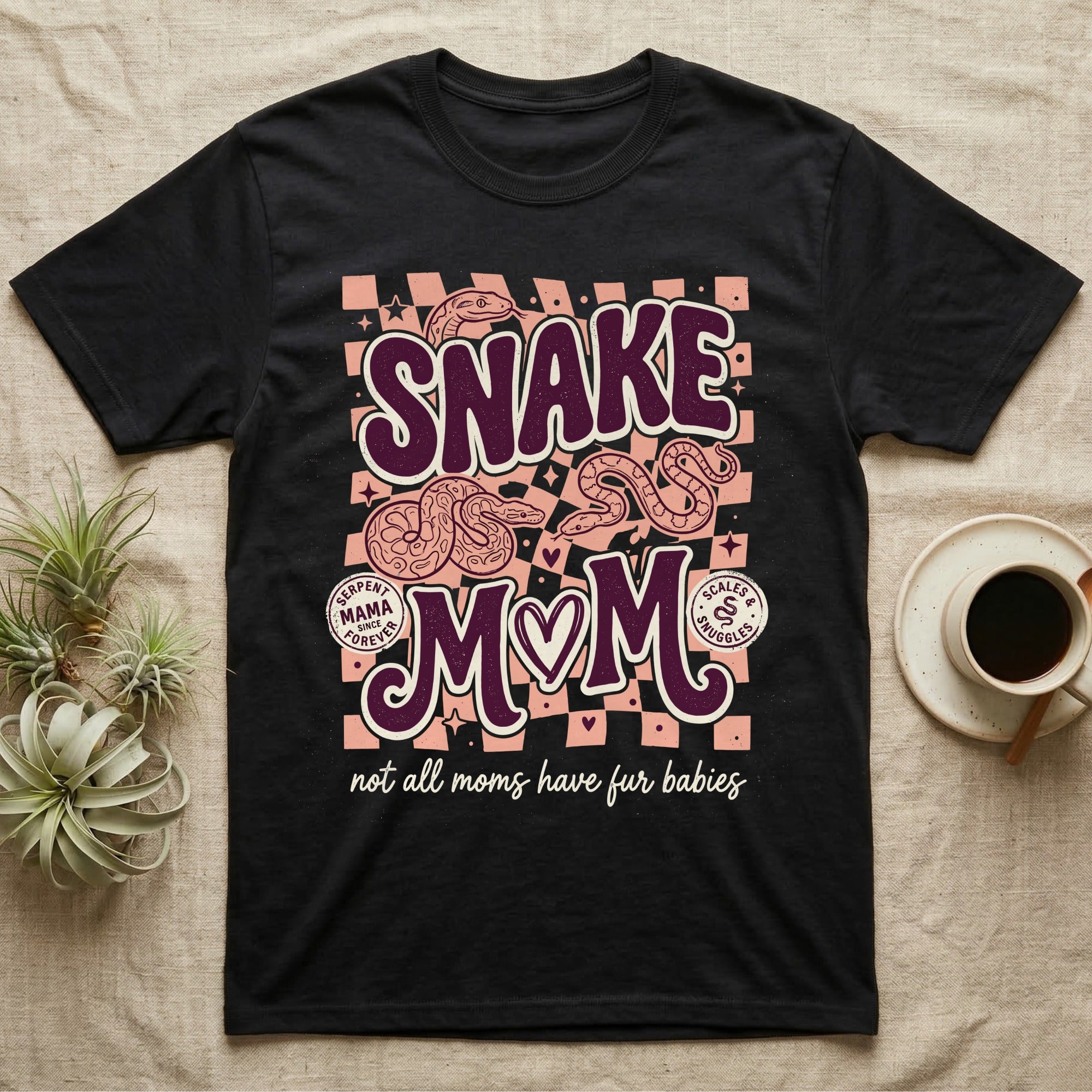 Black t-shirt with "Snake Mom" text and snake graphics, reading "not all moms have fur babies".