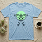 Light blue t-shirt with a stylized moth and moon design.