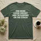 Reptile Loose Cricket T-Shirt in Military Green — Bold white capital letters stacked in four lines reading ONE MORE LOOSE CRICKET AND I'M SLEEPING ON THE COUCH