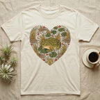 T-shirt with a heart-shaped illustration of a frog and lily pads.