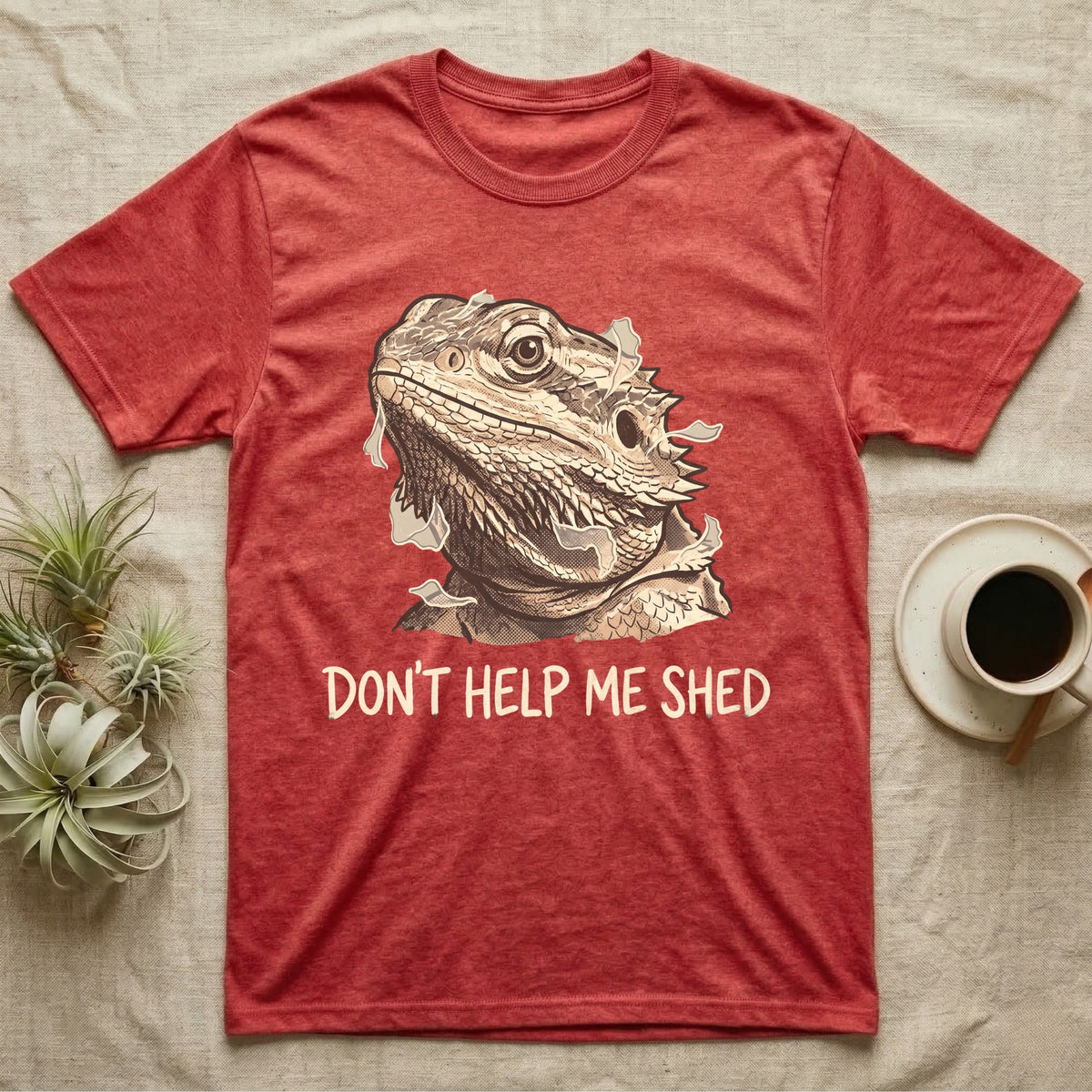 Don't Help Me Shed T-Shirt in Heather Red — Retro-illustration of a bearded dragon mid-shed with a deadpan side-eye and a marker caption reading Don't Help Me Shed.