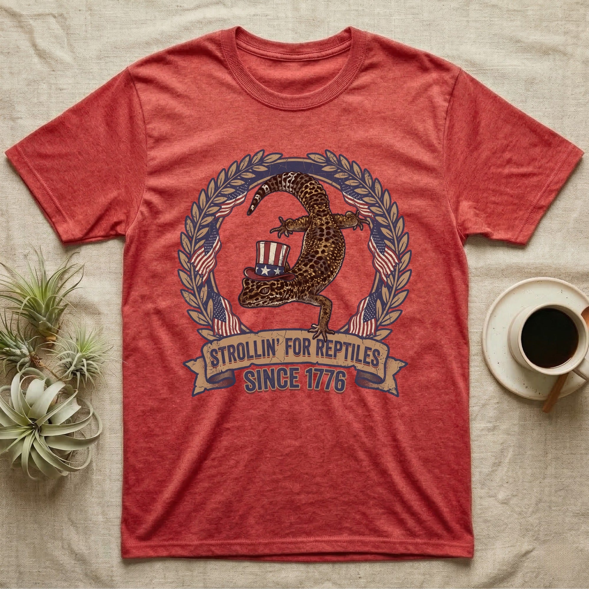 Leopard Gecko 1776 T-Shirt in Heather Red — Vintage badge of a leopard gecko in an Uncle Sam hat with laurel wreath and flags, banner reading Strollin' For Reptiles Since 1776.