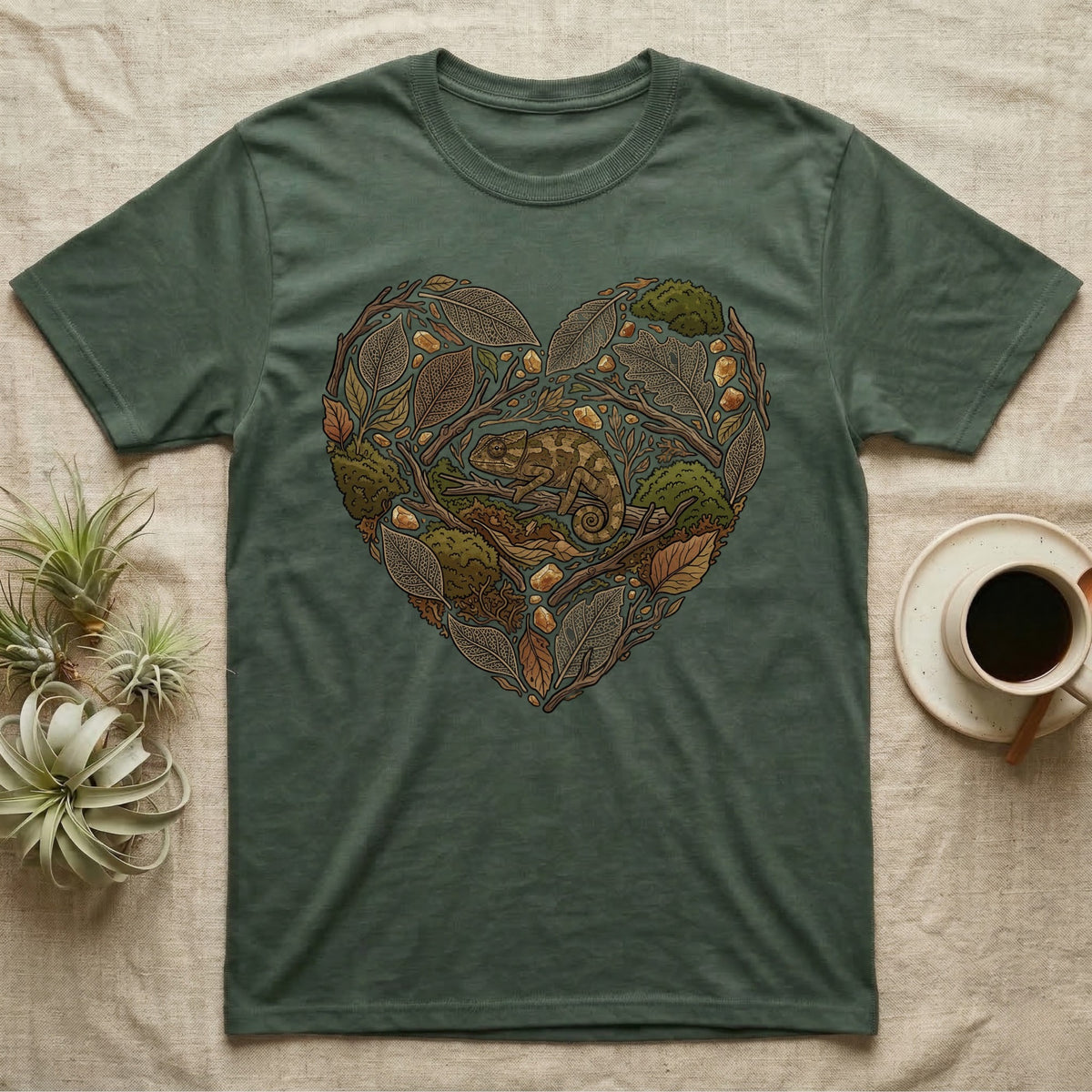Green t-shirt with a heart-shaped nature design featuring a chameleon.
