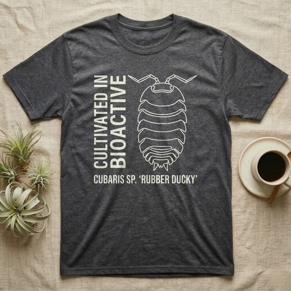 Rubber Ducky Isopod Line Art T-Shirt in Dark Heather — Bone-white outline drawing of a rubber ducky isopod labelled Cubaris sp. beside vertical stencil type.