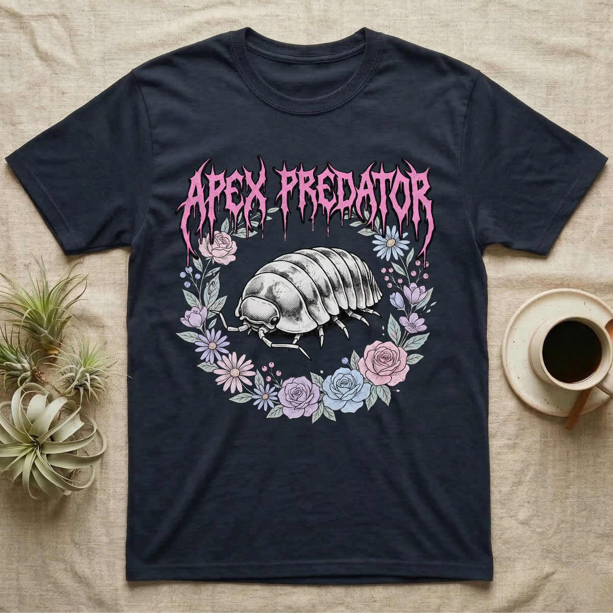 Apex Predator Isopod T-Shirt in Navy — Bootleg design of a cute isopod in a floral wreath under dripping death-metal lettering reading "Apex Predator."