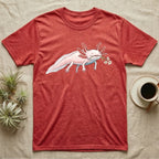 Axolotl Blossom T-Shirt in Heather Red — Watercolor illustration of a pink leucistic axolotl with feathery gills holding an aquatic blossom sprig, on a dark grey t-shirt.