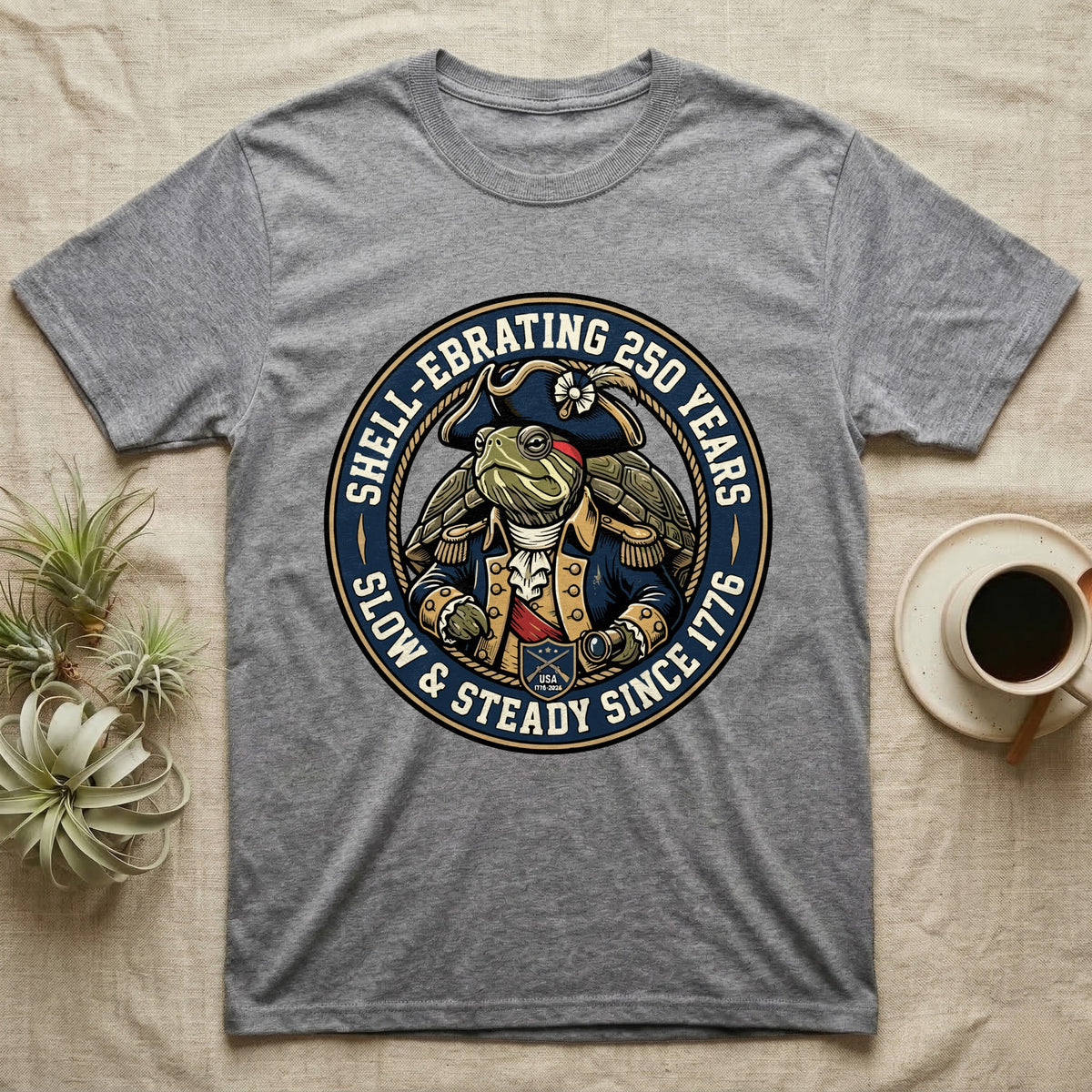 Sea Turtle General T-Shirt in Sport Grey — Circular crest of a sea turtle dressed as a Continental general with text Shell-Ebrating 250 Years.