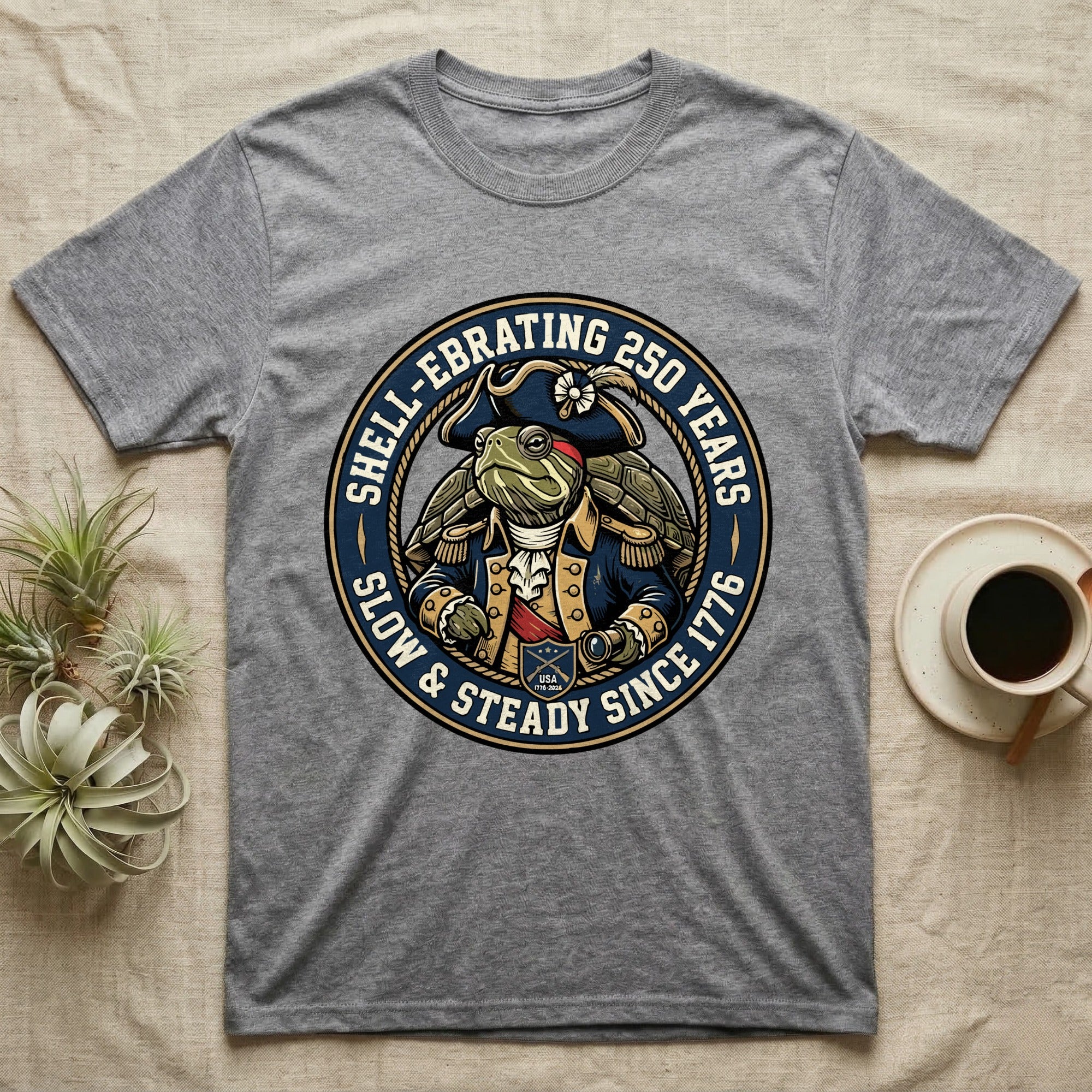 Sea Turtle General T-Shirt in Sport Grey — Circular crest of a sea turtle dressed as a Continental general with text Shell-Ebrating 250 Years.
