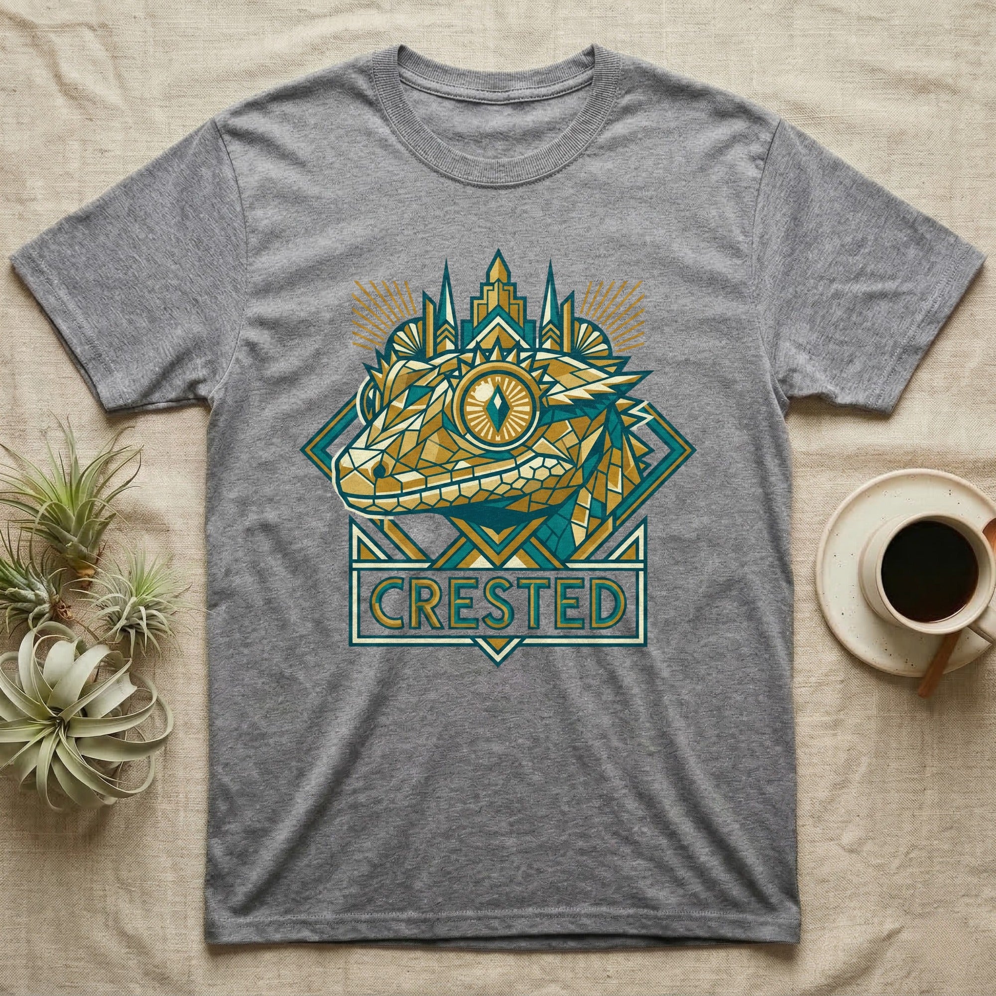 Grey t-shirt with a geometric crested gecko design and "CRESTED" text.
