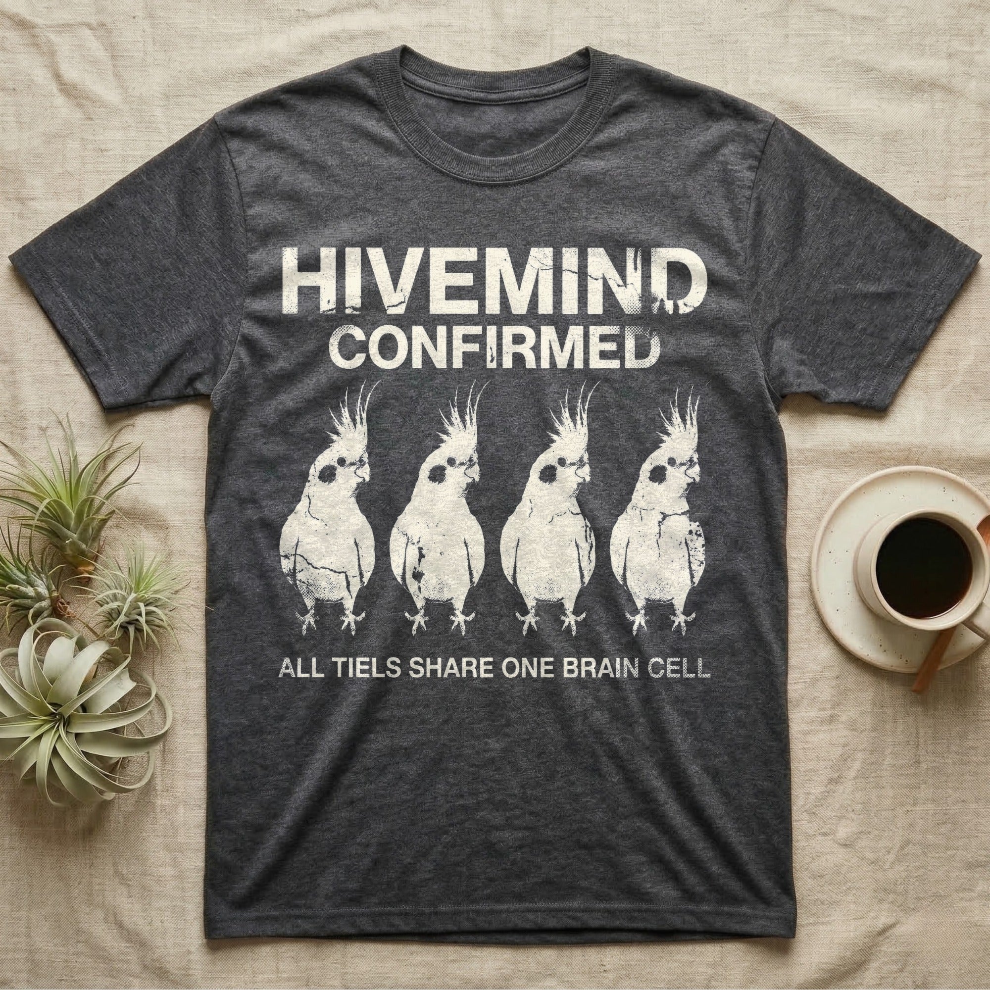 Cockatiel Hivemind Confirmed T-Shirt in Dark Heather — Grunge-distressed four cockatiels in identical synchronised posture with distressed type "Hivemind Confirmed."