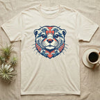 Cream t-shirt with a stylized otter face graphic featuring blue waves and red accents.