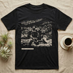 In Premolt Tarantula T-Shirt in Black — Dark macro illustration of a tarantula curled in its hide with a small tag reading "In Premolt, Do Not Perceive Me."