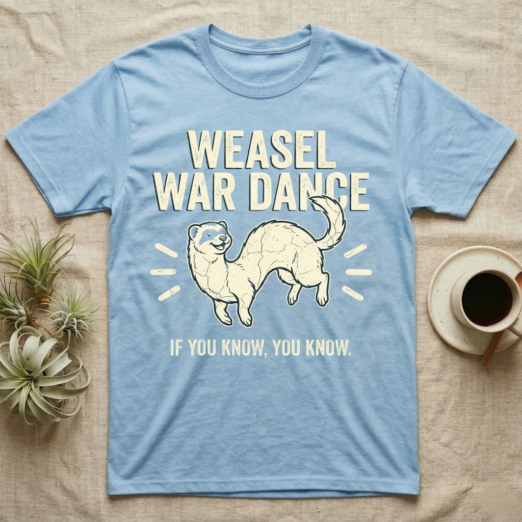 Weasel War Dance Ferret Tee in Light Blue — Grunge-distressed ferret mid-war-dance in S-curve bounce with stacked type "Weasel War Dance / If You Know."