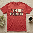 E-Reptile Dysfunction Gecko T-Shirt in Heather Red — Retro-pharmacy typographic wordmark reading "E-Reptile Dysfunction" in distressed cream and tomato-red lettering.