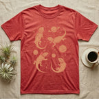 Bearded Dragon Cosmic T-Shirt in Heather Red — Vintage screen-print illustration of bearded dragons in astronaut helmets floating in space, warm copper monochromatic on dark background.