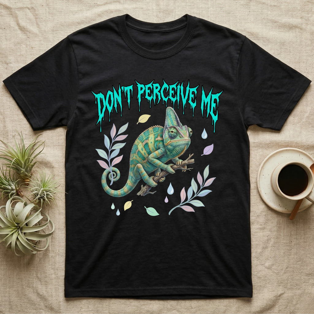 Veiled Chameleon Feral T-Shirt in Black — Veiled chameleon on a branch with swivelling eyes under a jagged turquoise metal "DON'T PERCEIVE ME" wordmark.